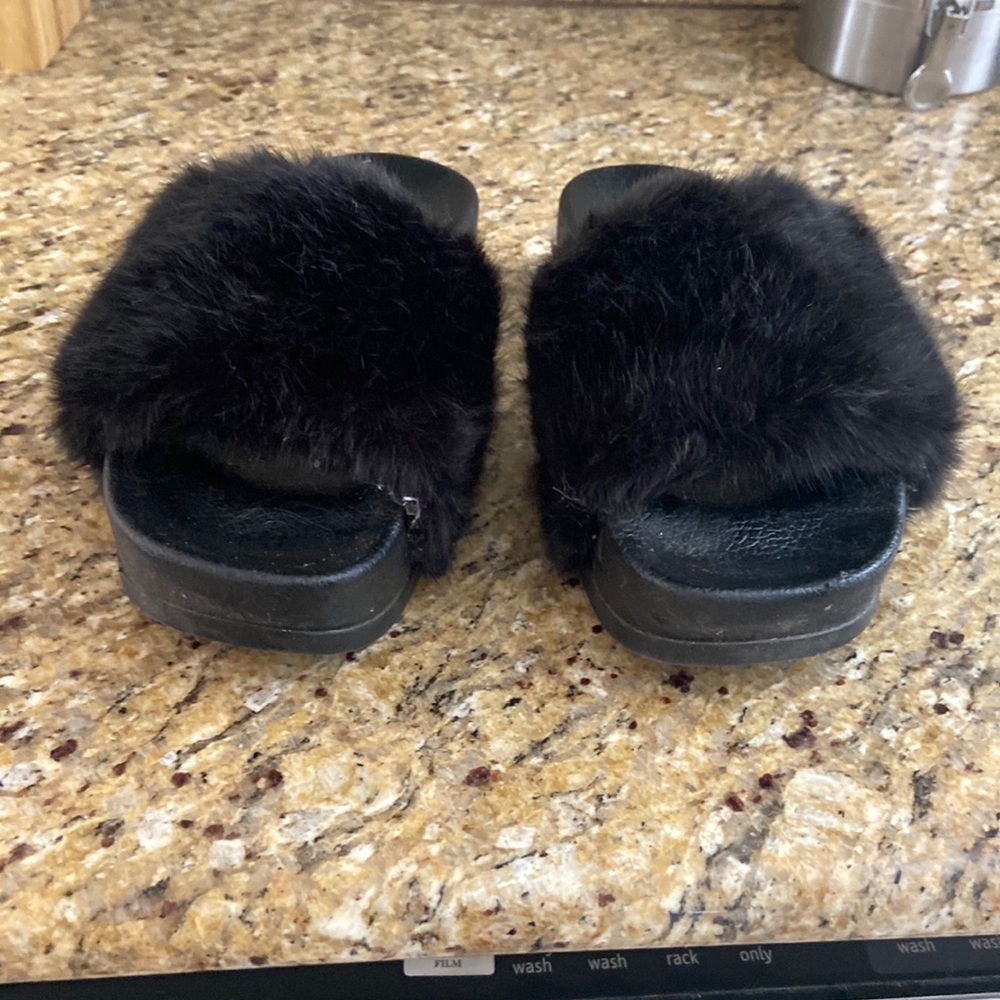 Size 6 1/2 black fur slippers, worn  twice from Amazon brand forever platform